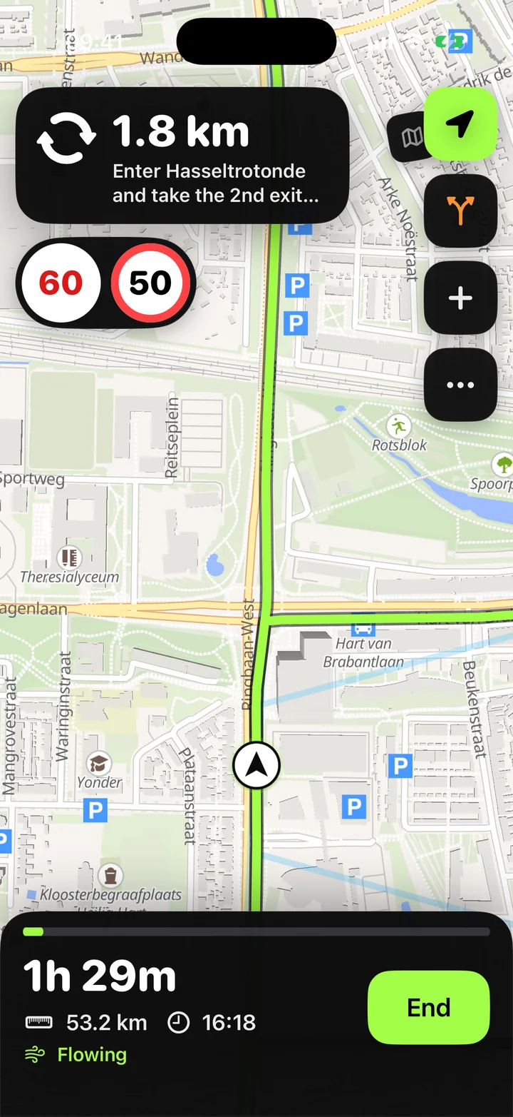 Curvano navigating a curvy road with the route drawn in green, the current speed and the speed limit